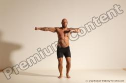 Underwear Gymnastic poses Man Black Muscular Bald Dancing Dynamic poses Academic